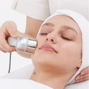 Woman receiving facial care
